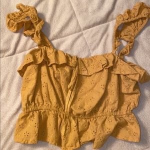 Cropped fringe top